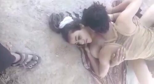 Pakistani girl enjoys outdoor fun with field worker
