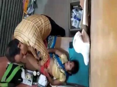 Doctor examines rural patient sensitive procedure